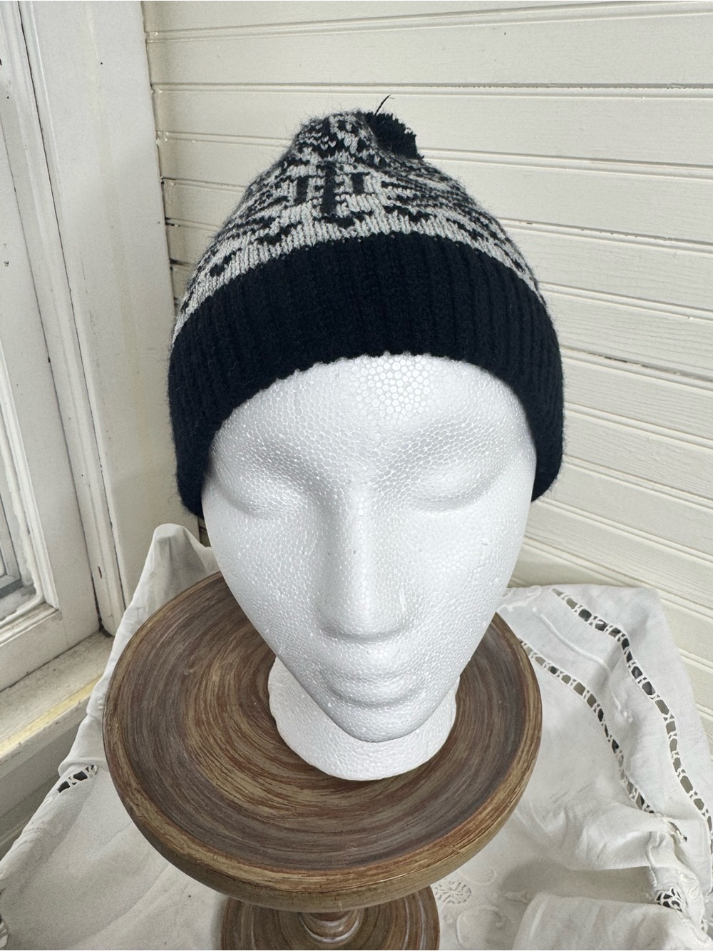 Black & white stocking hat with black pompom